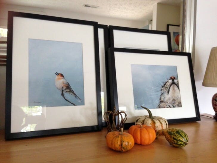 "Scottish Songbird" and "Lola in the Sky" fine art prints framed in 12x16 inch frames.
