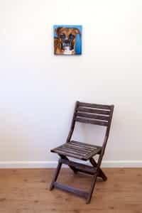 Pet portrait of a french bulldog by artist Erica Eriksdotter and a chair