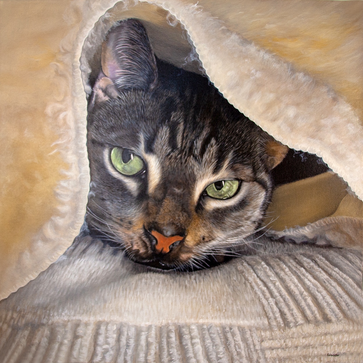 Custom pet portraits painted by Erica Eriksdotter, featuring a realistic portrait of a green-eyed tabby cat nestled in a blanket, created for a private client.