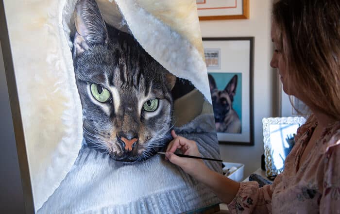 Erica Eriksdotter building layers of color in her slow art process.