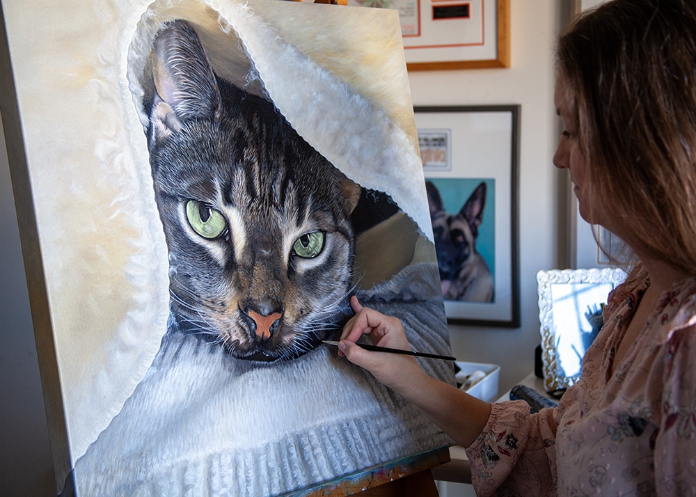 Erica Eriksdotter building layers of color in her slow art process.